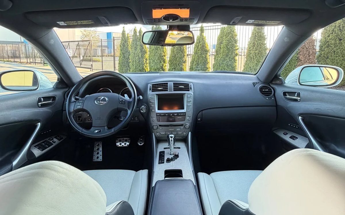 Clean front cabin of a Lexus after mobile detailing in Surrey: dash, console, and seats