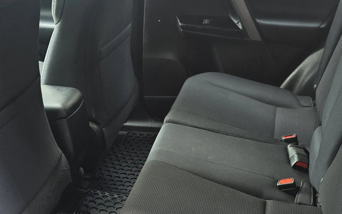 Clean rear seats and floor of an SUV after deep interior detailing in Surrey
